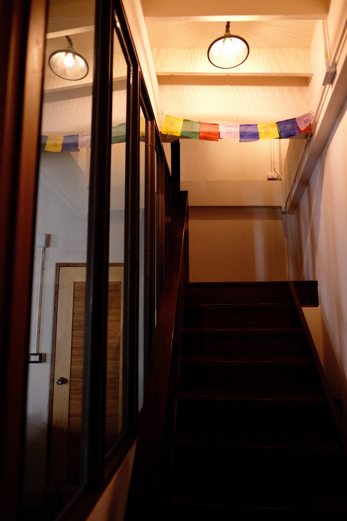 Stairwell with prayer flags